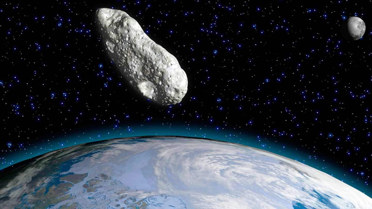 Photo de l'espace avec un astéroïde proche de la Terre.