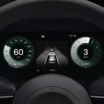 Apple CarPlay Ultra dashboard display with speedometer, ADAS lane view and tachometer inside steering wheel