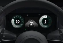 Apple CarPlay Ultra dashboard display with speedometer, ADAS lane view and tachometer inside steering wheel