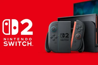 Console Nintendo Switch 2 noire avec Joy-Con rouges et interface de dock, sur fond rouge