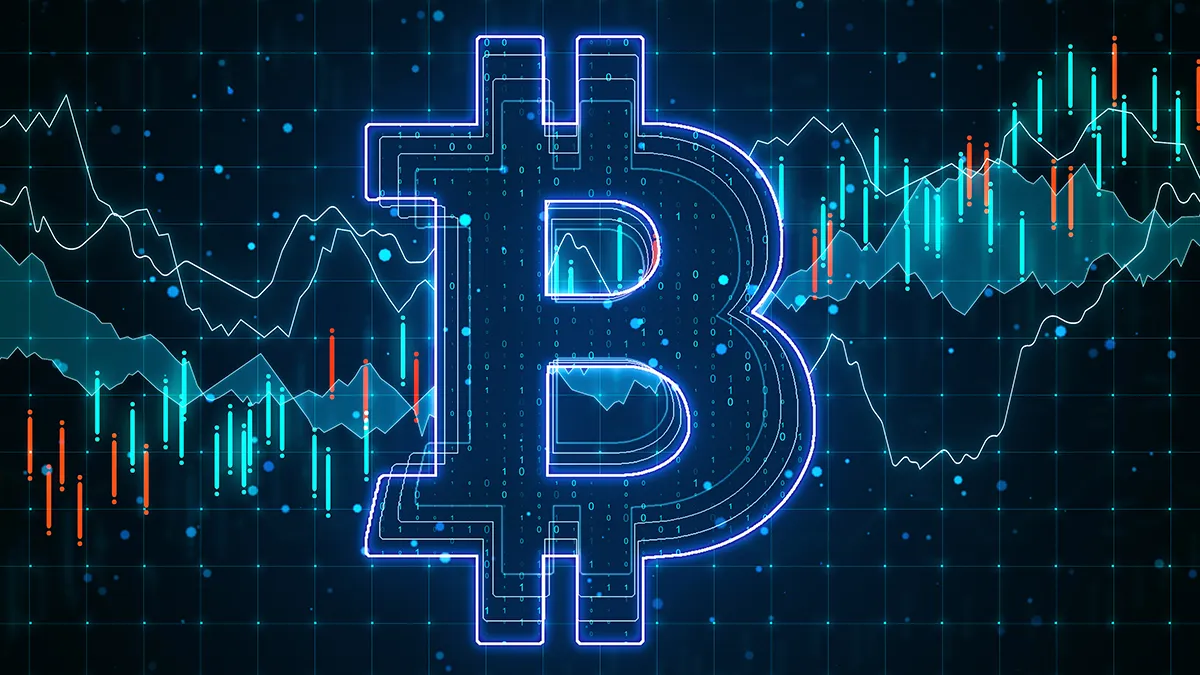 Symbole du bitcoin sur fond de graphiques financiers illustrant la hausse du marché