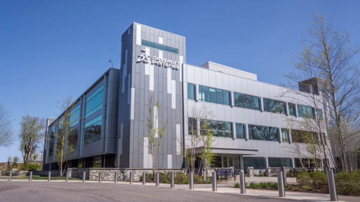 Siège de Dassault Systèmes, façade vitrée, illustrant la baisse en Bourse après l’ajustement des objectifs 2025.